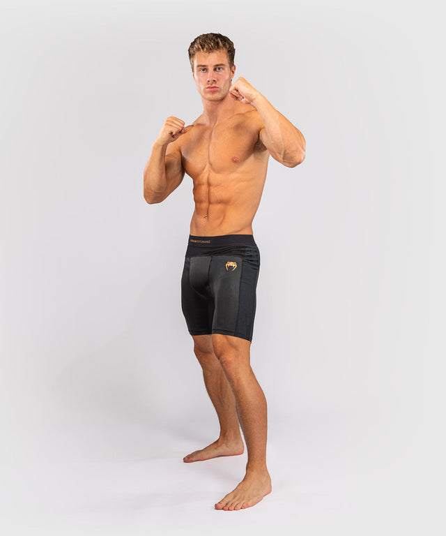 Pantaloni scurți de compresie Venum G-Fit Revolution G-Fit Vale Tudo – Negru/Cupru