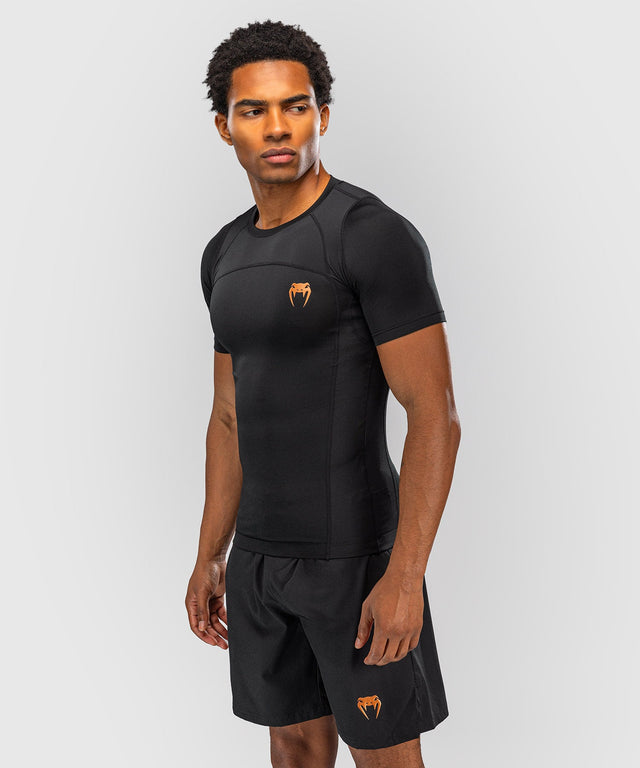 Rashguard Venum G-Fit Revolution manches courtes – Noir/Cuivré