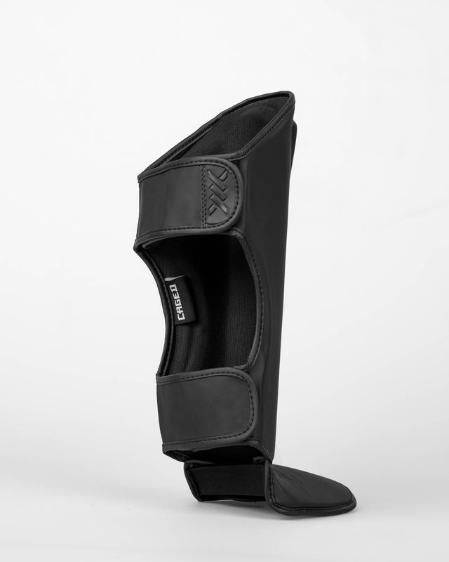 Protège-tibias Caged Spark Enfant – Noir mat