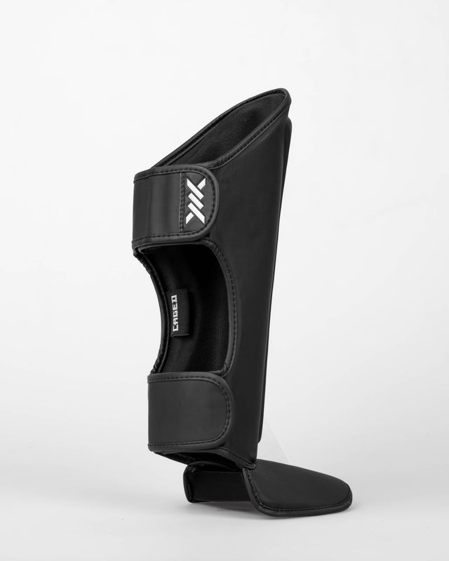 Caged Spark Kids Shin Guards – Matte Black/White