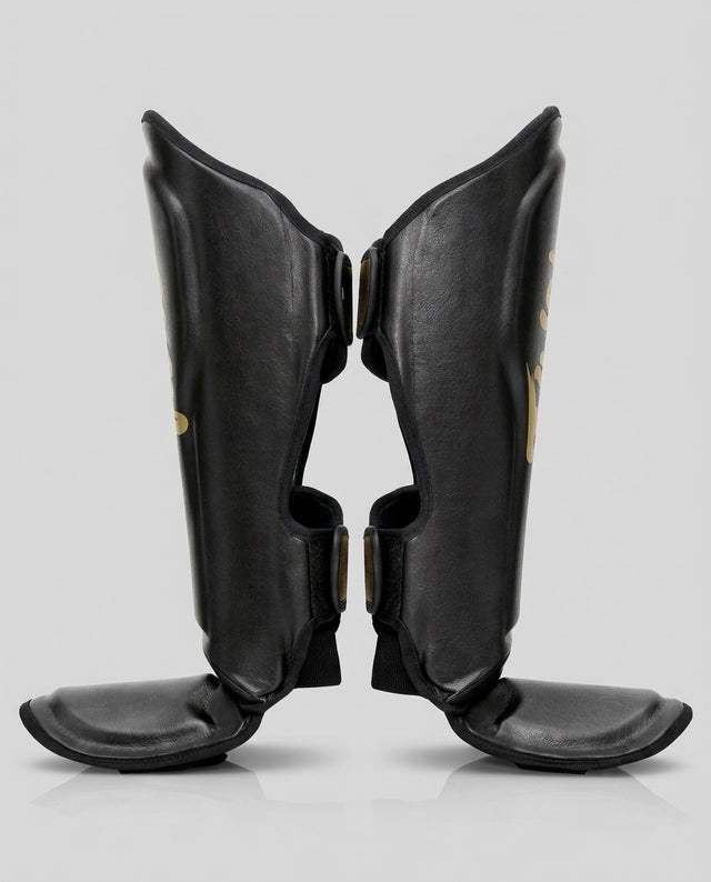 Espinilleras Fairtex FXB – Negro/Oro