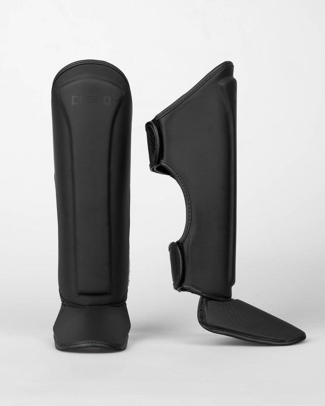 Protège-tibias Caged Spark Enfant – Noir mat