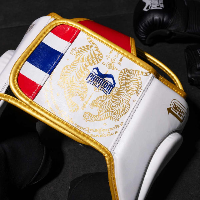 Casco de boxeo Phantom Athletics Muay Thai – Blanco/Oro