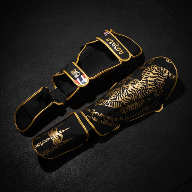Protège-tibias Phantom Athletics Muay Thai – Noir/Or