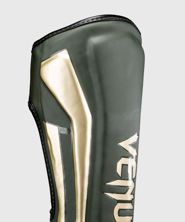 Venum Schienbeinschoner Elite – Khaki Grün/Gold