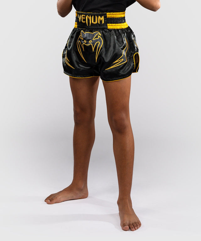 Calções de Muay Thai Venum Bangkok Fury Criança – Preto/Ouro