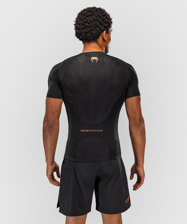 Rashguard Venum G-Fit Revolution manches courtes – Noir/Cuivré