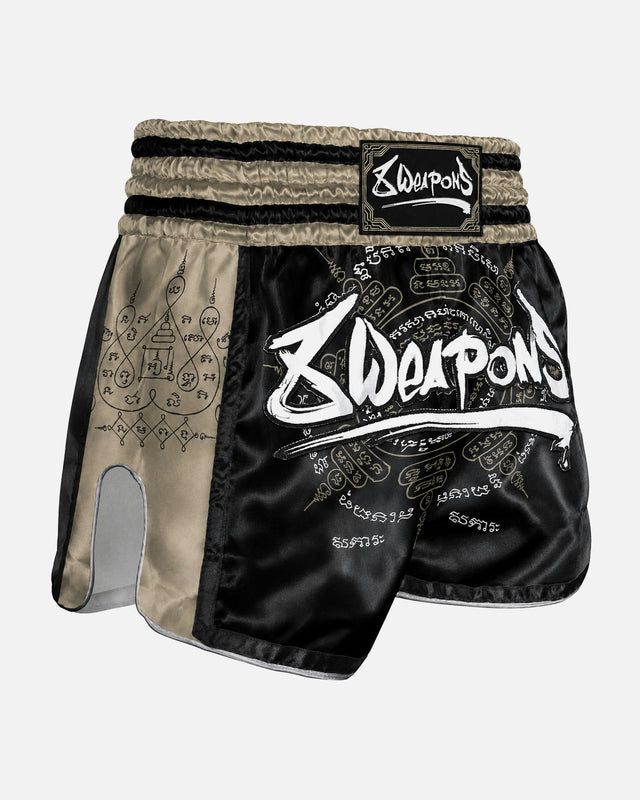 8 WEAPONS Muay-Thai-Shorts 8 Ways Yant 2.0 – Schwarz/Sand