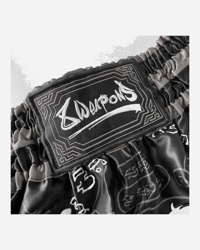 Pantalones de Muay Thai 8 WEAPONS 8 Ways Yant 2.0 – Negro