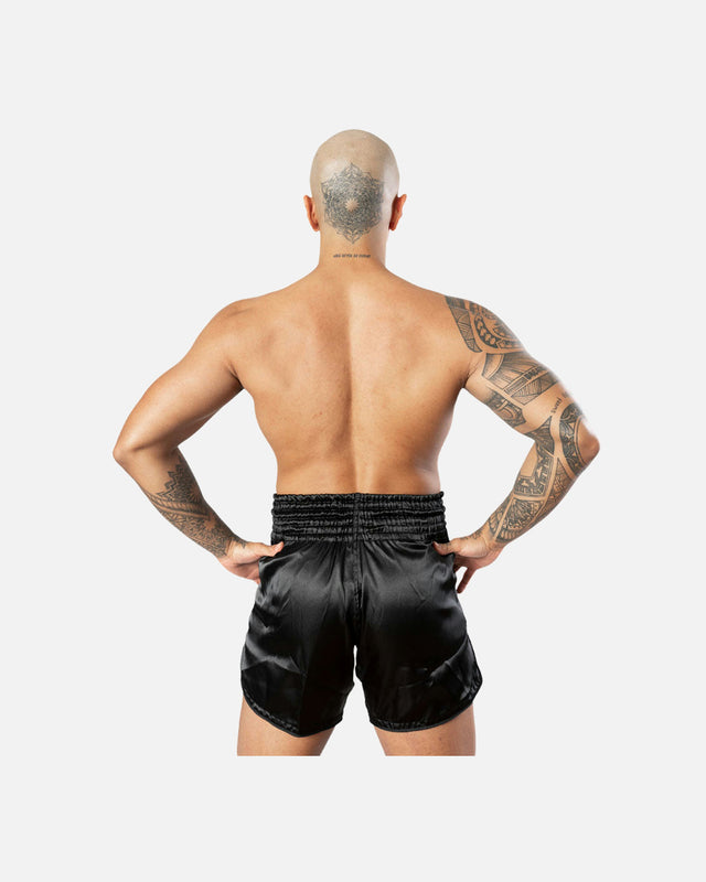Pantalones de Muay Thai 8 WEAPONS Strike – Negro/Oro