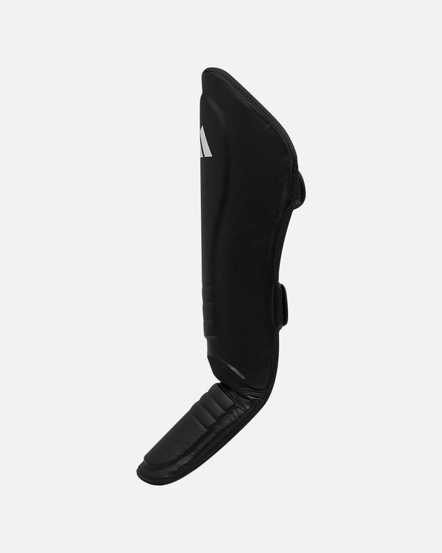 Paratibie Adidas Speed Thai Shin-n-Step – Nero/Bianco