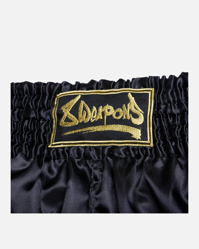 Pantalones de Muay Thai 8 WEAPONS Strike – Negro/Oro