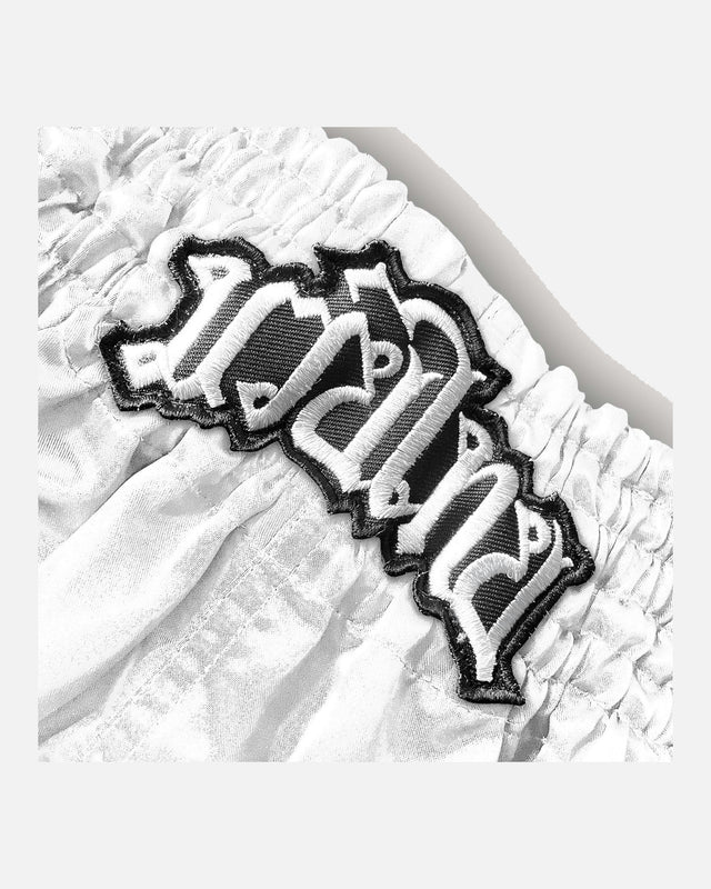 8 WEAPONS Muay Thai Shorts Mongkol – White/Black