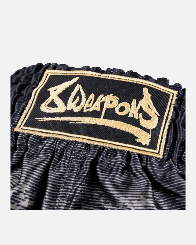 8 WEAPONS Muay-Thai-Shorts Hanuman – Schwarz/Gold