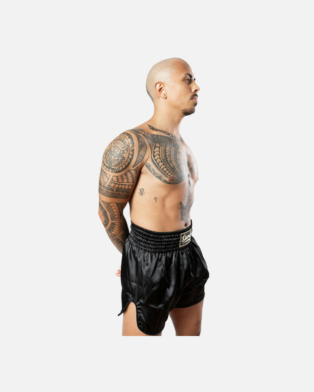 Pantalones de Muay Thai 8 WEAPONS Strike – Negro/Oro