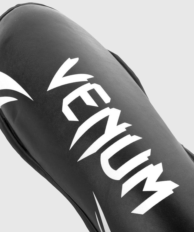 Protège-tibias Venum Challenger – Noir/Blanc