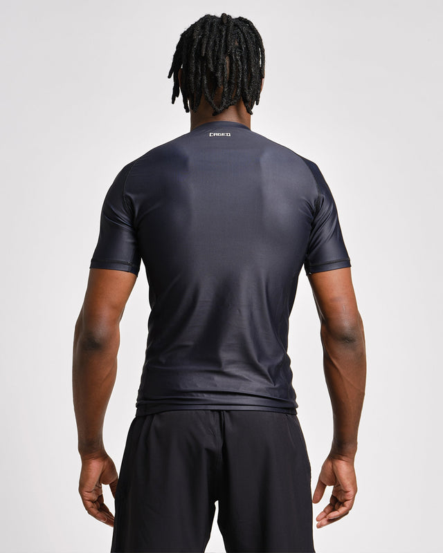 Rashguard Caged Tactical Mangas Cortas – Negro