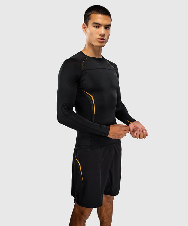 Rashguard Venum G-Core Manga Larga – Negro/Oro