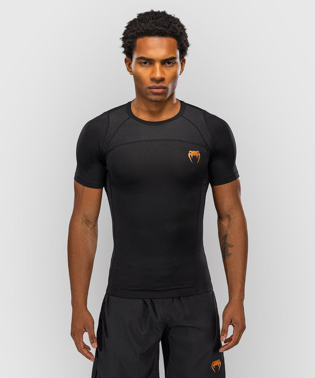 Rashguard Venum G-Fit Revolution manches courtes – Noir/Cuivré