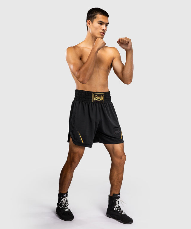 Venum Boksshorts G-Core – Schwarz/Gold