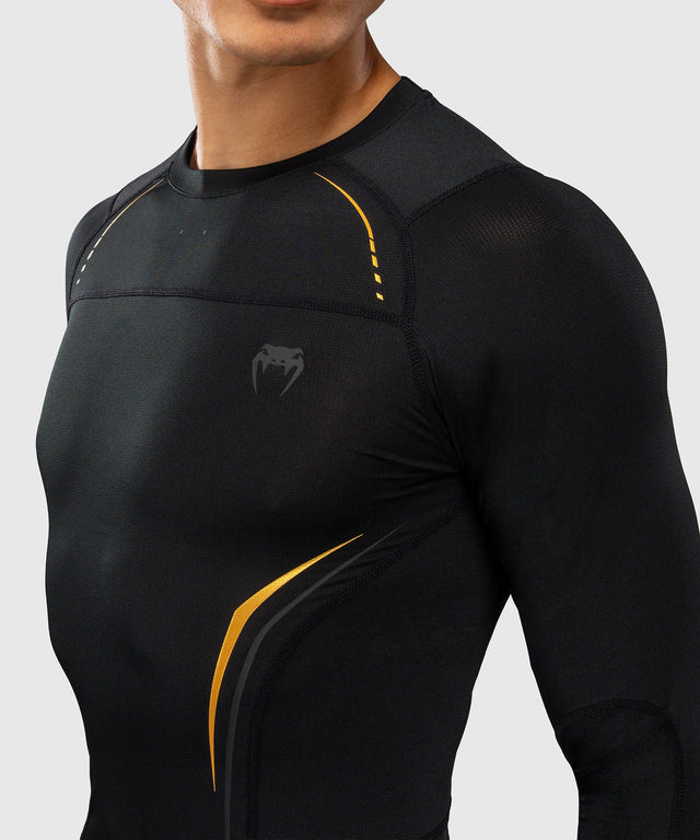 Rashguard Venum G-Core Manga Larga – Negro/Oro