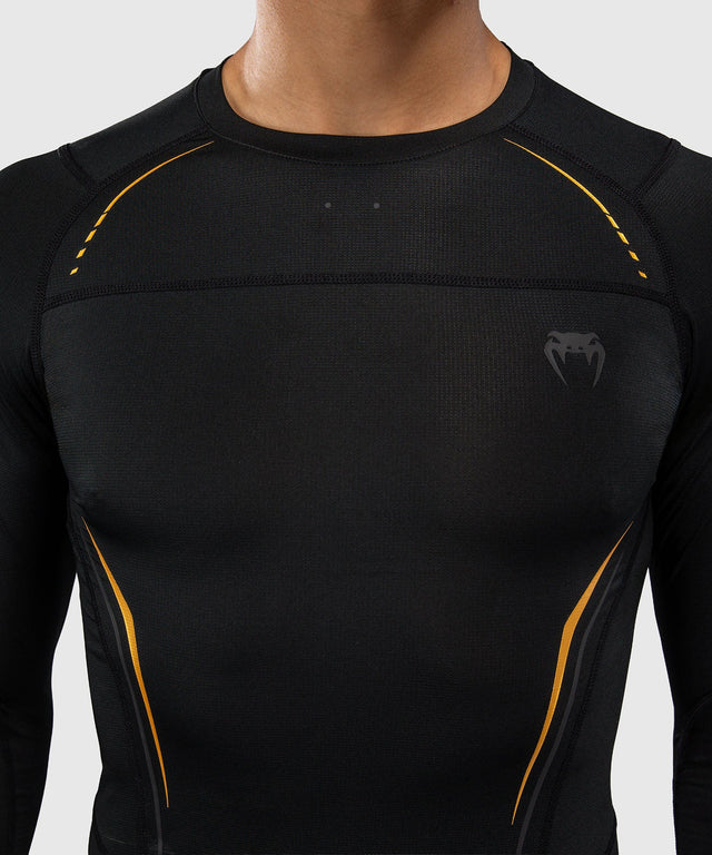 Rashguard Venum G-Core Manga Larga – Negro/Oro