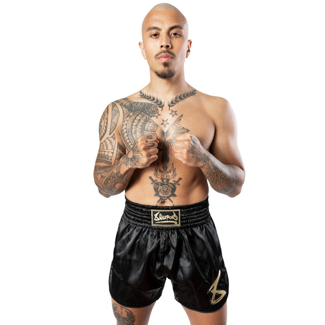 Pantalones de Muay Thai 8 WEAPONS Strike – Negro/Oro