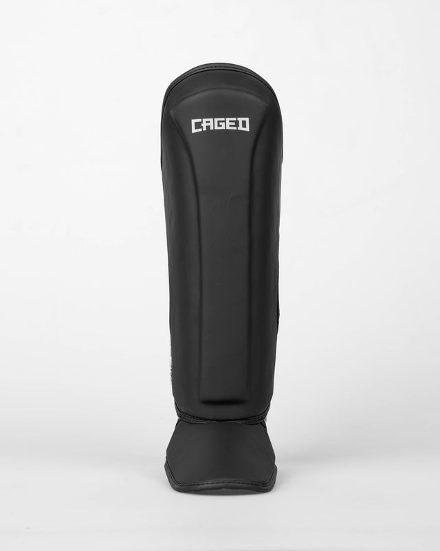 Caged Spark Kids Shin Guards – Matte Black/White