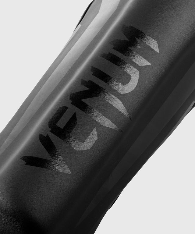 Venum Schienbeinschoner Elite Kinder – Schwarz