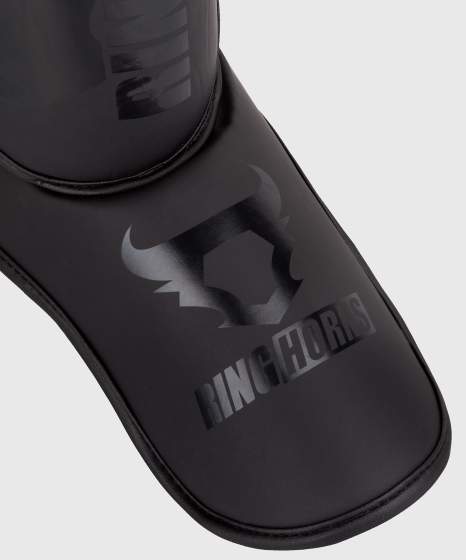 Protège-tibias Ringhorns Charger – Noir/Noir