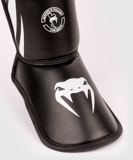 Espinilleras Venum Challenger Kickboxing Niños – Negro/Blanco