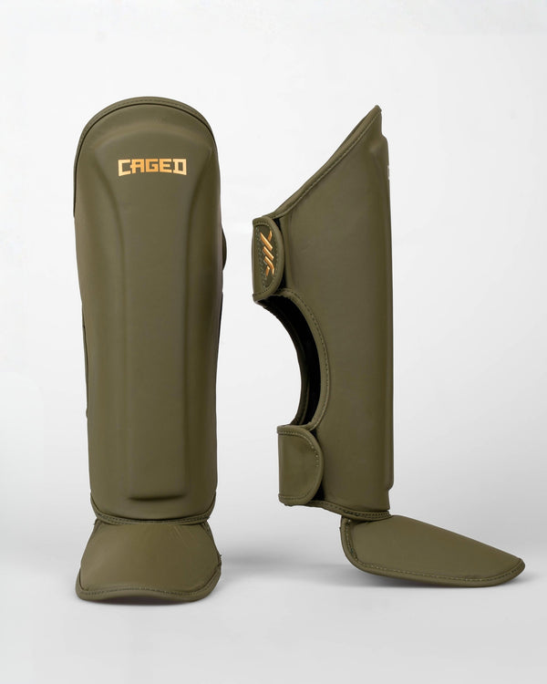 Caged Spark Kids Shin Guards – Khaki Green/Gold