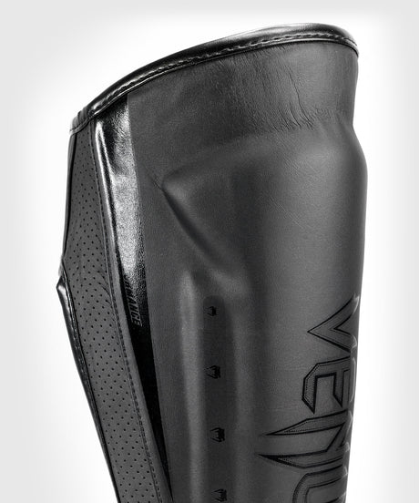 Espinilleras Venum Elite Evo – Negro/Negro