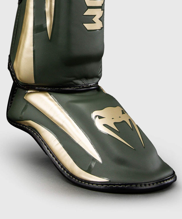 Venum Schienbeinschoner Elite – Khaki Grün/Gold