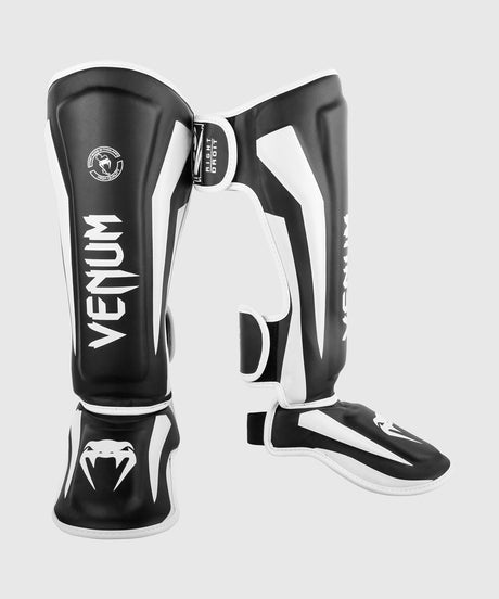 Espinilleras Venum Elite – Negro/Blanco