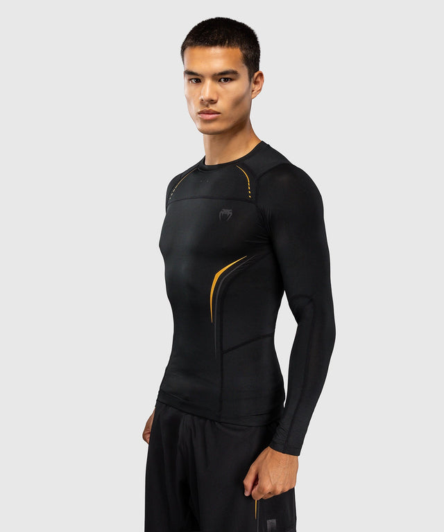 Rashguard Venum G-Core Manga Larga – Negro/Oro