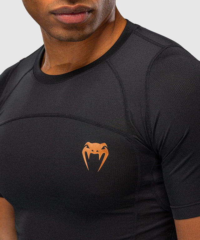 Rashguard Venum G-Fit Revolution manches courtes – Noir/Cuivré