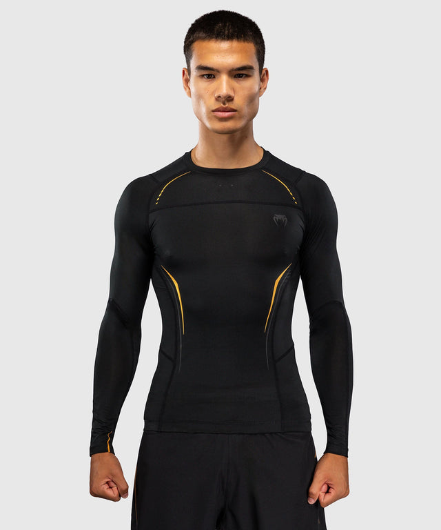 Rashguard Venum G-Core Manga Larga – Negro/Oro