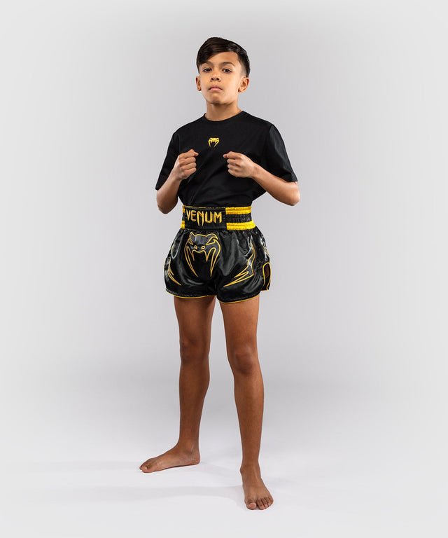 Calções de Muay Thai Venum Bangkok Fury Criança – Preto/Ouro