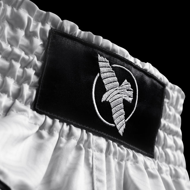 Pantaloncini Muay Thai Hayabusa Core – Bianco
