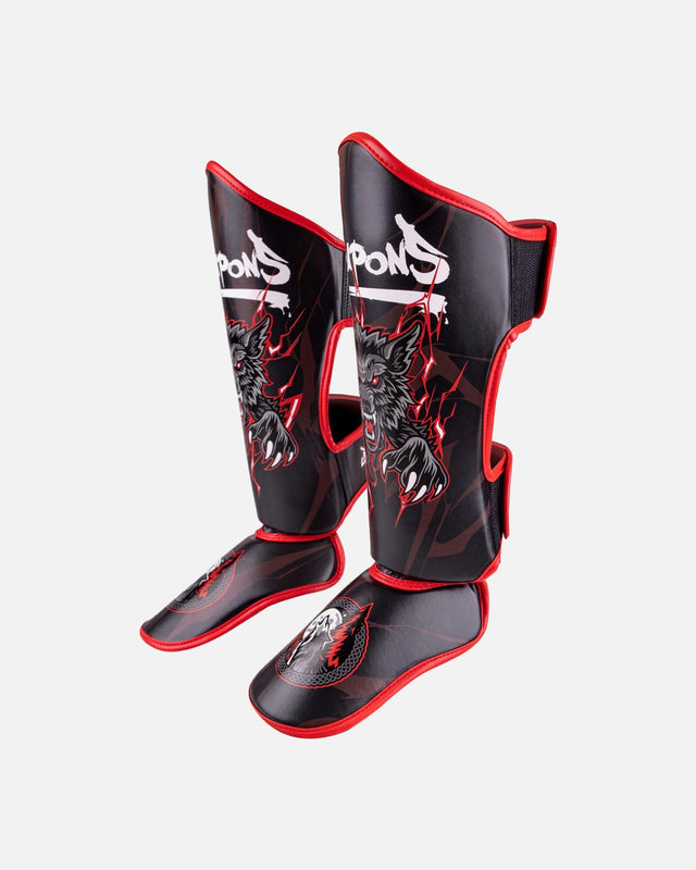 8 WEAPONS Schienbeinschoner Beastial Wolf – Schwarz/Rot