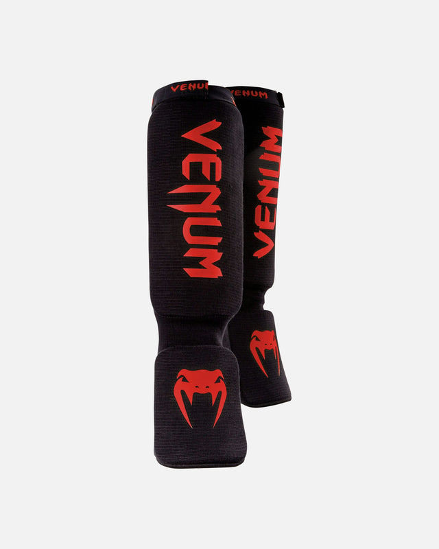 Espinilleras Venum Kontact – Negro/Rojo