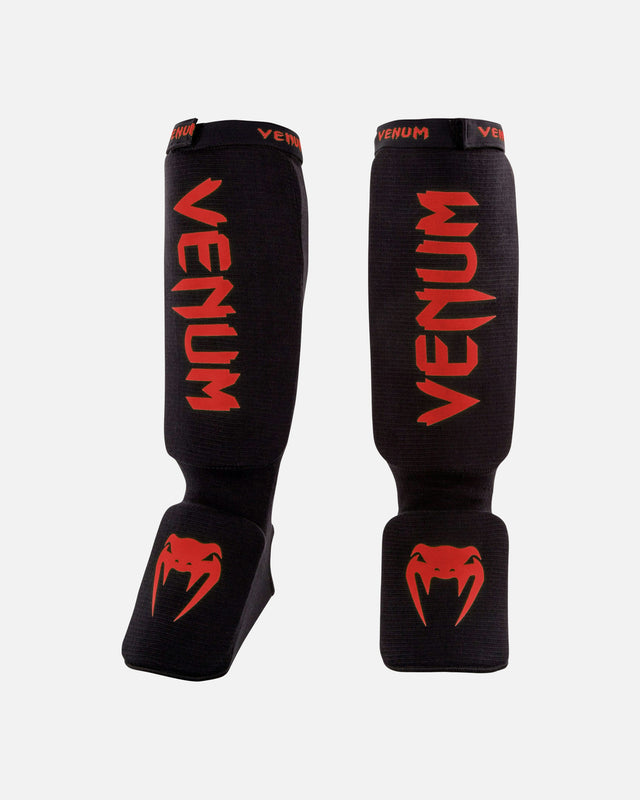 Espinilleras Venum Kontact – Negro/Rojo
