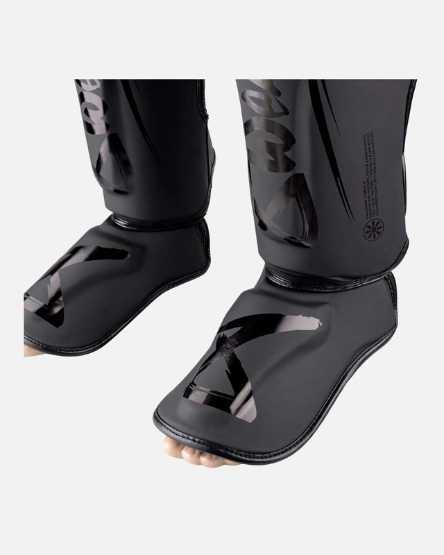 Espinilleras 8 WEAPONS Force 8 – Negro