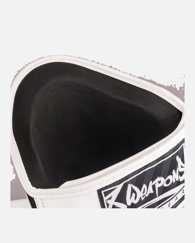 Espinilleras 8 WEAPONS Unlimited 2.0 – Blanco/Negro