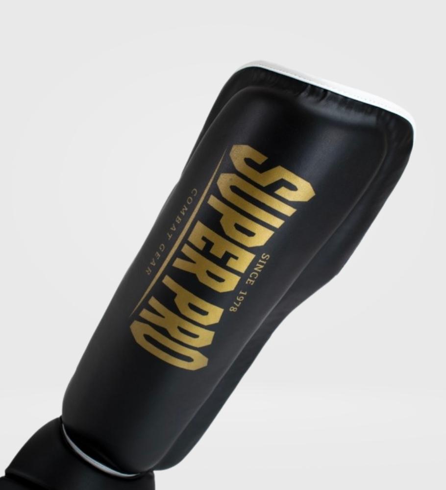 Super Pro Kickboks Scheenbeschermers Protector - Zwart/Goud - Scheenbeschermers