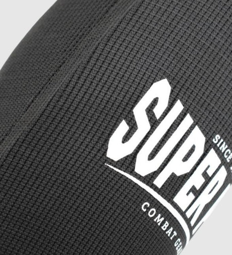 Protège-tibias Super Pro Defender – Noir/Blanc – Protège-tibias
