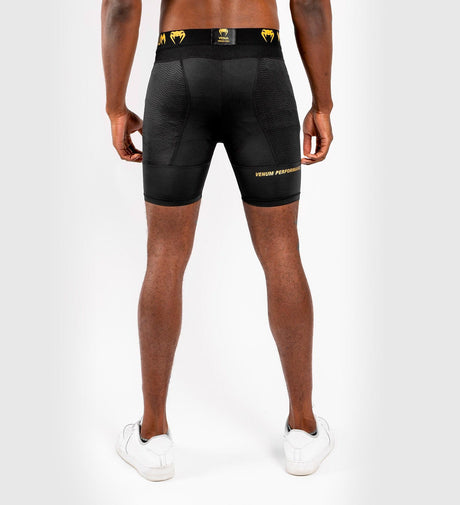 Venum Kompressionsshorts G Fit – Schwarz/Gold – Kompressionsshorts