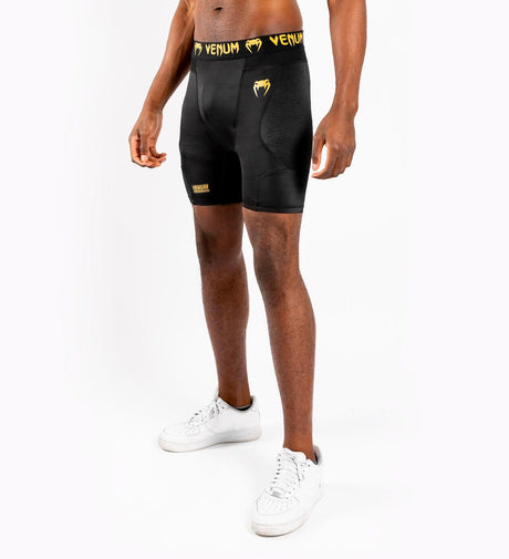 Venum Kompressionsshorts G Fit – Schwarz/Gold – Kompressionsshorts