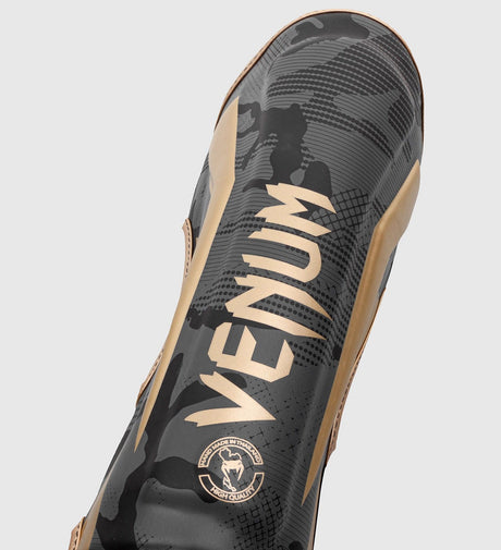 Protège-tibias Venum Elite – Gris camo/Or
